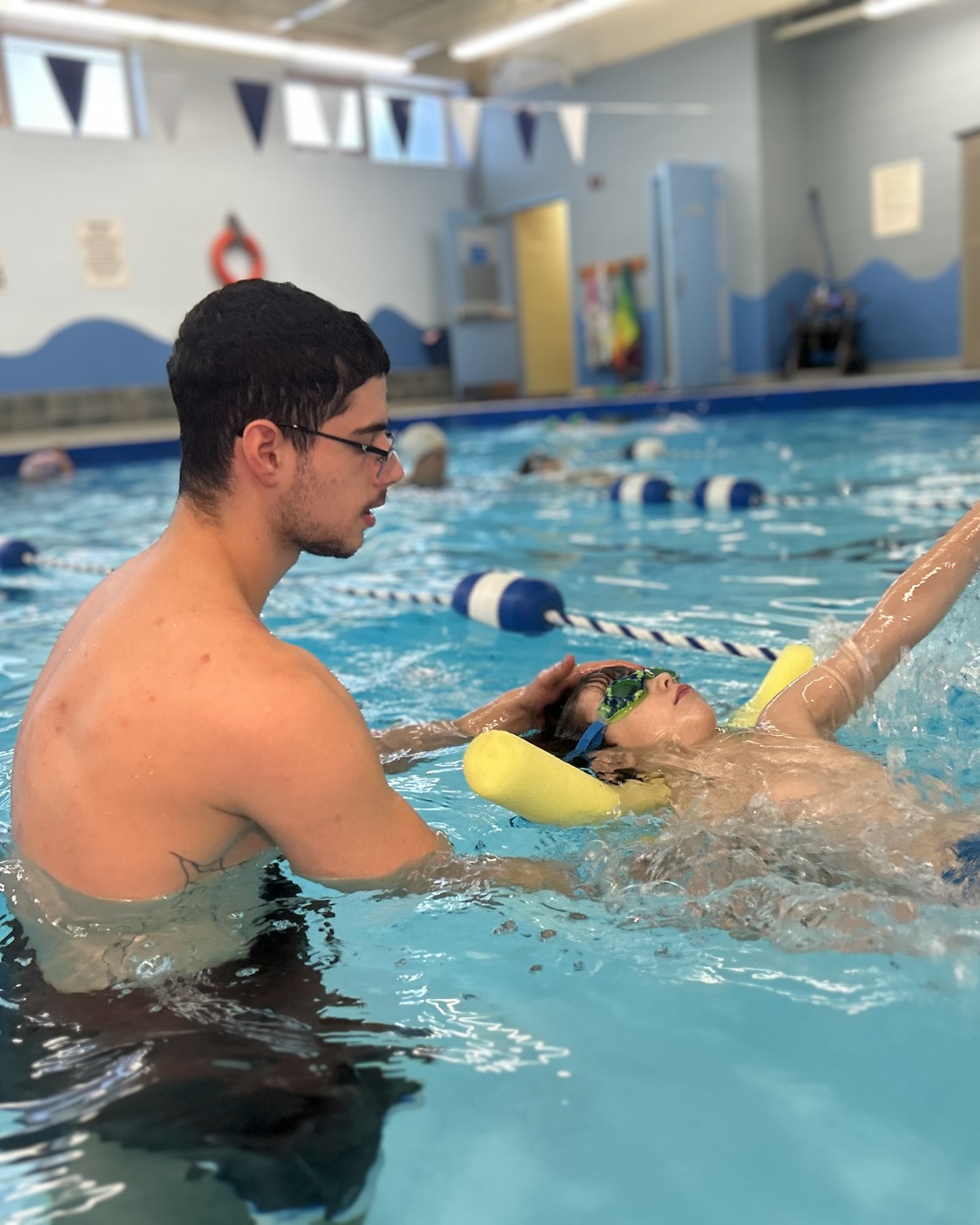 Private swim lessons, backstroke swimming technique