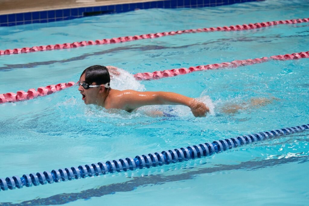 Intermediate swimming program with kickboard drills and calorie-burning strokes, Butterfly stroke